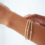 14k Solitaire Diamond Bangle Bracelet 0.10 - 0.30 ctw Ferkos Fine Jewelry