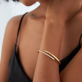 14K Cross Over Graduating Diamond Bangle Ferkos Fine Jewelry