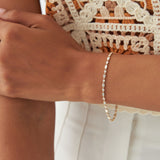 14K Gold Round and Baguette Diamond Bracelet Ferkos Fine Jewelry