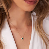 14k Oval Shape Emerald with Baguette Halo Setting Necklace Ferkos Fine Jewelry