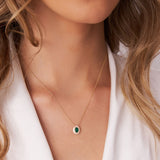 14k Oval Shape Emerald with Baguette Halo Setting Necklace Ferkos Fine Jewelry
