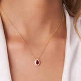 14k Oval Shape Ruby with Baguette Halo Setting Necklace Ferkos Fine Jewelry