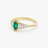 14k Gold Marquise Shape Emerald Ring with Baguette Accents Ferkos Fine Jewelry