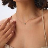 14K Tiny Emerald Cross Necklace Ferkos Fine Jewelry