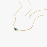 14k Marquise Emerald with Halo Diamond Setting  Ferkos Fine Jewelry
