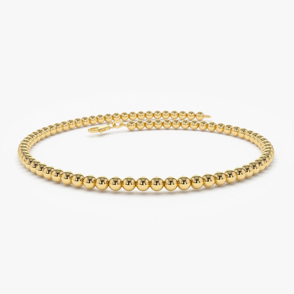 14k Dainty Gold Beaded Bracelet. Dangling Gold Bead Bracelet