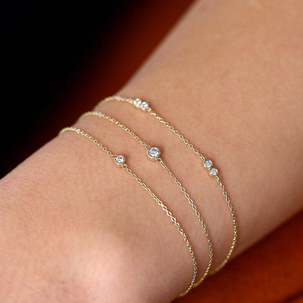 14k yellow gold diamond initial bracelet with 2 diamond bezels — The Jewelry  Showroom