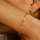 14k Gold Cuban Link Bracelet w/ Bezel Setting Diamond Ferkos Fine Jewelry