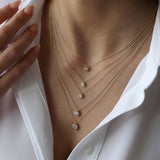 14K 0.20-0.50 ctw Diamond Solitaire on a Bail Ferkos Fine Jewelry