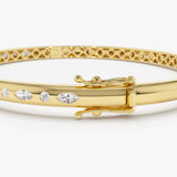 14k Gold Flush Setting Marquise Shaped and Round Diamond Bangle  Ferkos Fine Jewelry