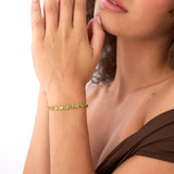14K Gold Oval Shaped Peridot Tennis Bracelet 13.70 ctw Ferkos Fine Jewelry