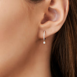 14k Rose Diamond Huggies with a Dangling Round Diamond Ferkos Fine Jewelry