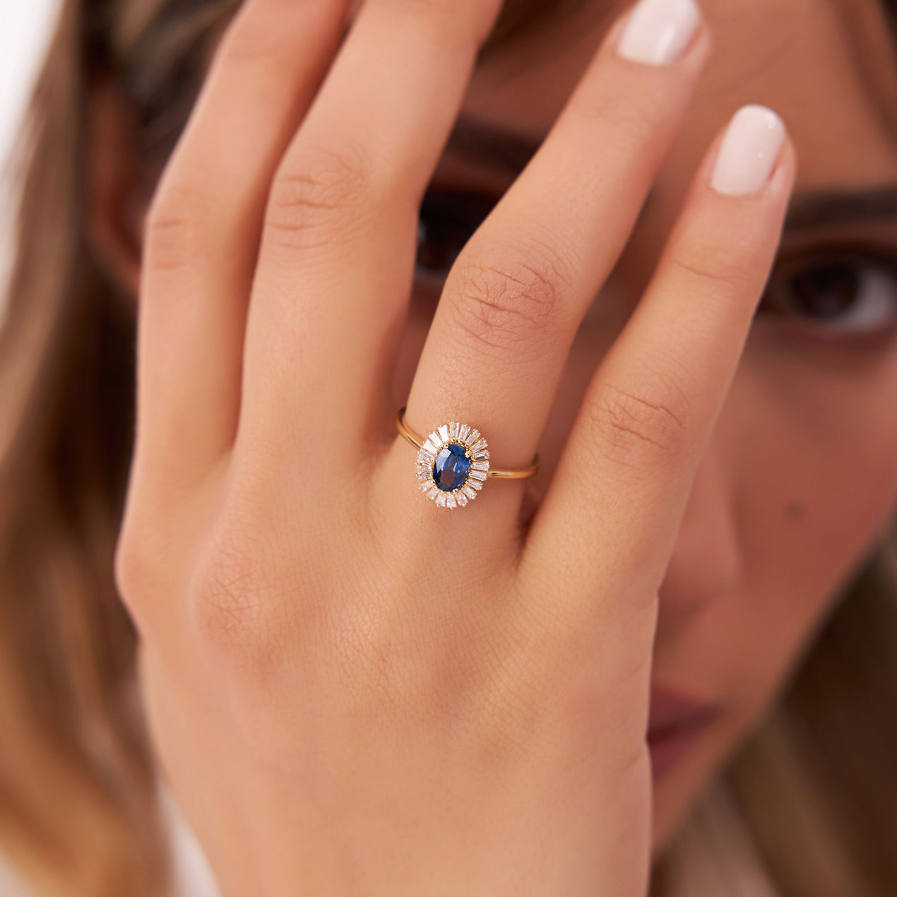 Sapphire ring with baguette on sale diamonds