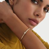 0.55 ctw 14K Gold Oval Lab Grown Diamond Bezel Bangle Bracelet, worn on model, view 2
