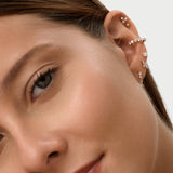 0.10 ctw 14K Gold Round Lab Grown Diamond Trio Flat Back Piercing, worn on model, view 2
