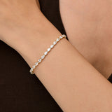 6.45 ctw 14K Gold Oval Lab Grown Diamond Tennis Bracelet, worn on model, view 5