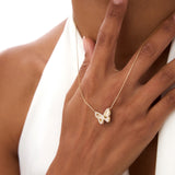 14K Gold Round Diamond Butterfly Necklace with Fluted Texture - 0.18 Ctw, worn on model, view 2