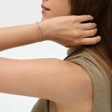 5.00 ctw 14K Gold Oval Lab Grown Diamond Bezel Tennis Bracelet, worn on model, view 5