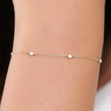 14K  Round Diamond Five Station Bracelet - 0.20 Ctw, worn on model