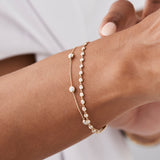 14K Gold Round Diamond Station Bracelet, Bezel Diamonds By The Yard Chain, worn on model, view 2