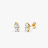 0.80 ctw 14K Gold Pear and Round Lab Grown Diamond Toi et Moi Stud Earrings Ferko's Fine Jewelry