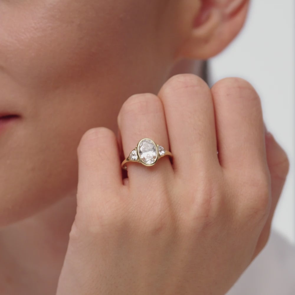 2.50 CTW 14K Oval Bezel Set Lab Grown Diamond Engagement Ring with Trillion Side Stones - Tilli Ferkos Fine Jewelry