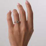 14k Marquise Shaped Emerald and Baguette Diamond Ring