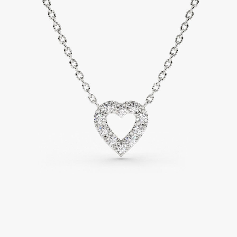 1/10 CT. T.W. Composite Diamond Heart Pendant in 10K White Gold|Banter | Heart  pendant diamond, Heart pendant gold, Diamond heart