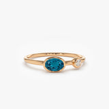 14k Gold Oval London Blue Topaz  and Diamond Ring 14K Rose Gold Ferkos Fine Jewelry