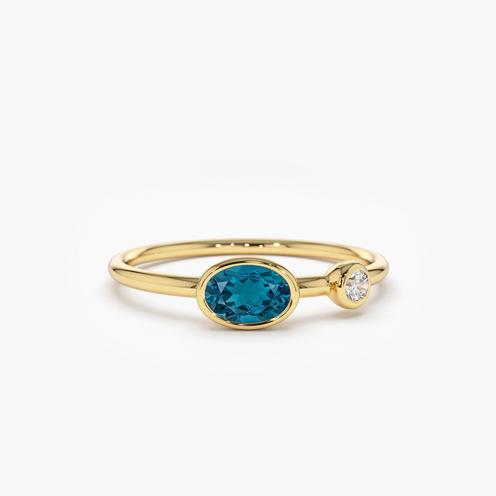 14k Gold Oval London Blue Topaz  and Diamond Ring 14K Gold Ferkos Fine Jewelry