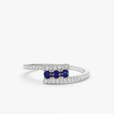 14k Cross Over Diamond Ring with Round Blue Sapphires 14K White Gold Ferkos Fine Jewelry